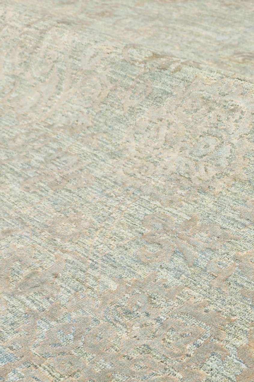 Border detail of sage green Ghazni hand-knotted rug