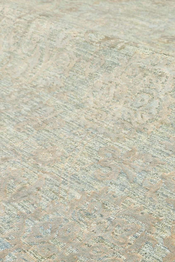 Border detail of sage green Ghazni hand-knotted rug