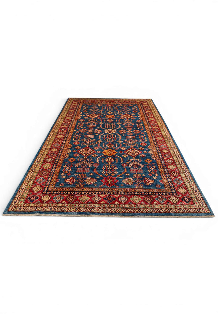 Border detail of blue red Kazak hand-knotted rug