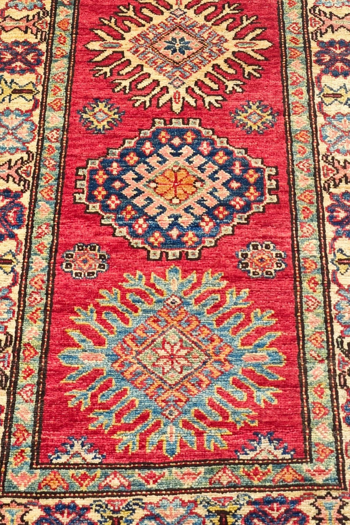 Hand-knotted Kazak runner with bold Caucasian geometry