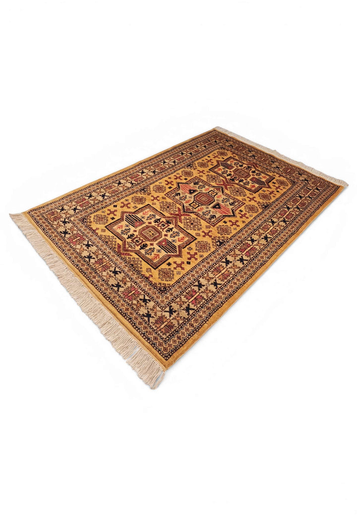 Gold star medallion Kazak rug 122×176cm, bold geometry