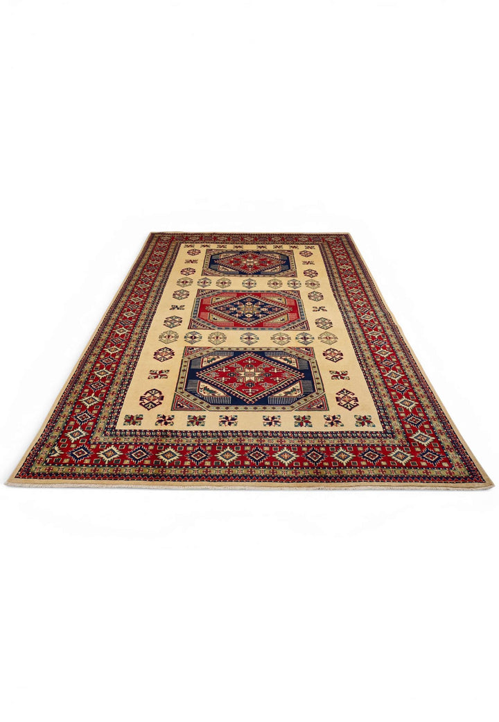 Border detail of ivory and red Kazak hand-knotted Afghan rug