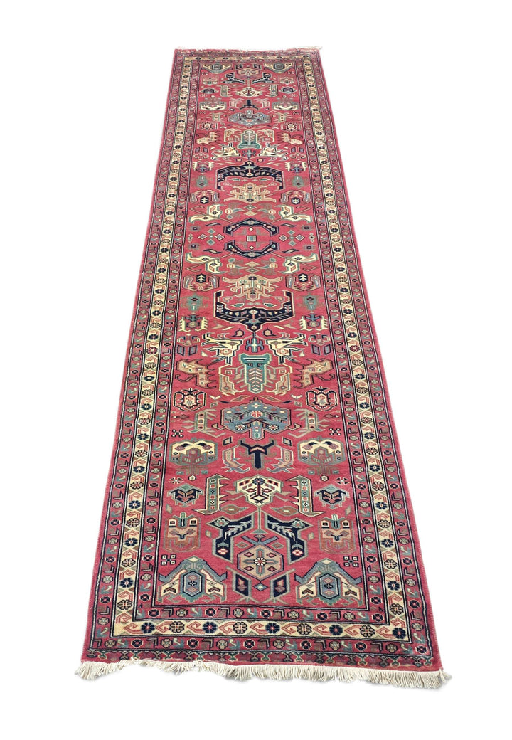 Border detail of rose teal Kazak hand-knotted runner