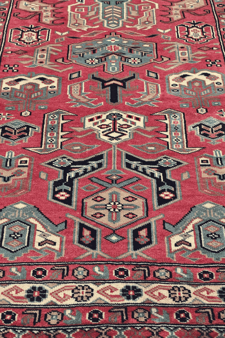 Hand-knotted Kazak runner with bold Caucasian geometry