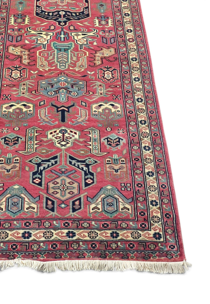 Corner of rose teal Kazak hand-knotted runner