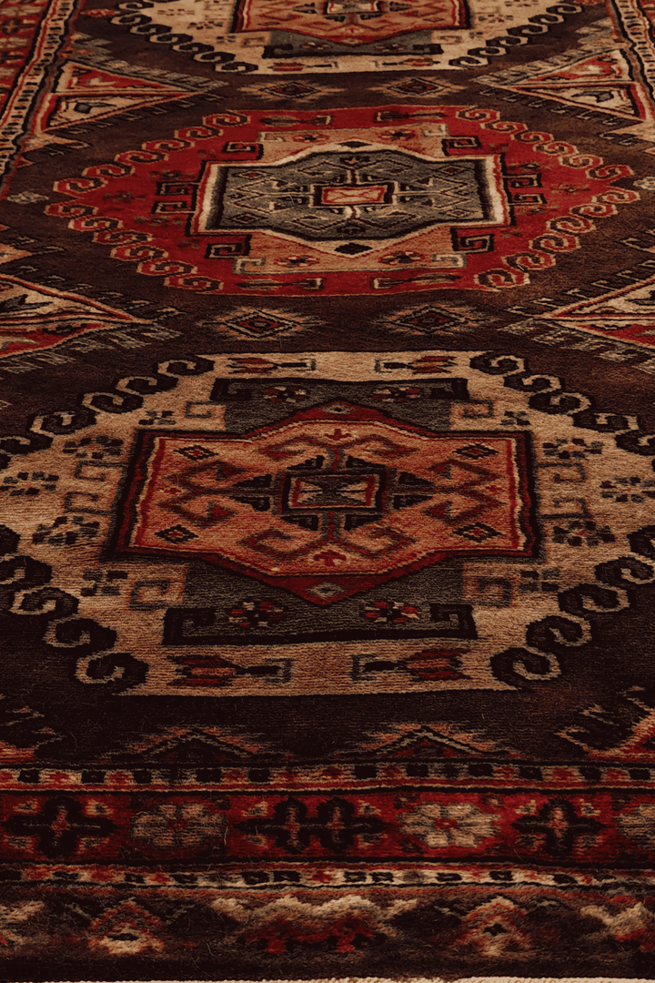 Hand-knotted Kazak runner with bold Caucasian geometry