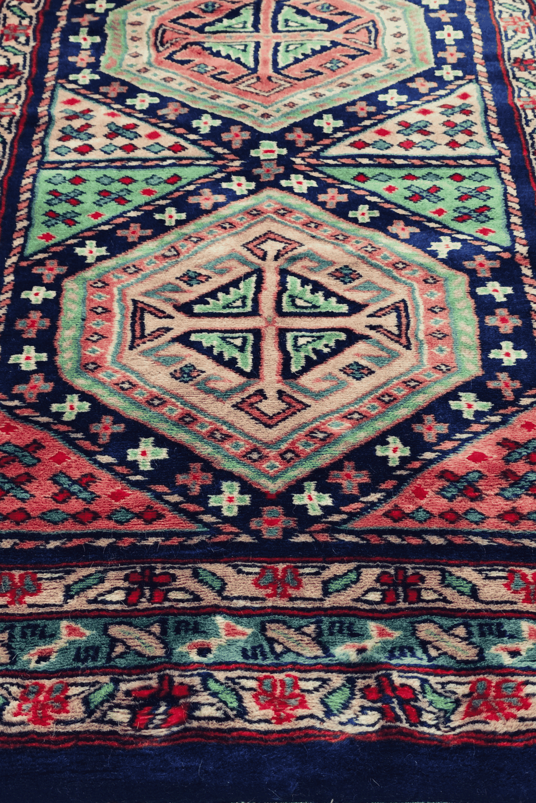 Hand-knotted Kazak runner with bold Caucasian geometry
