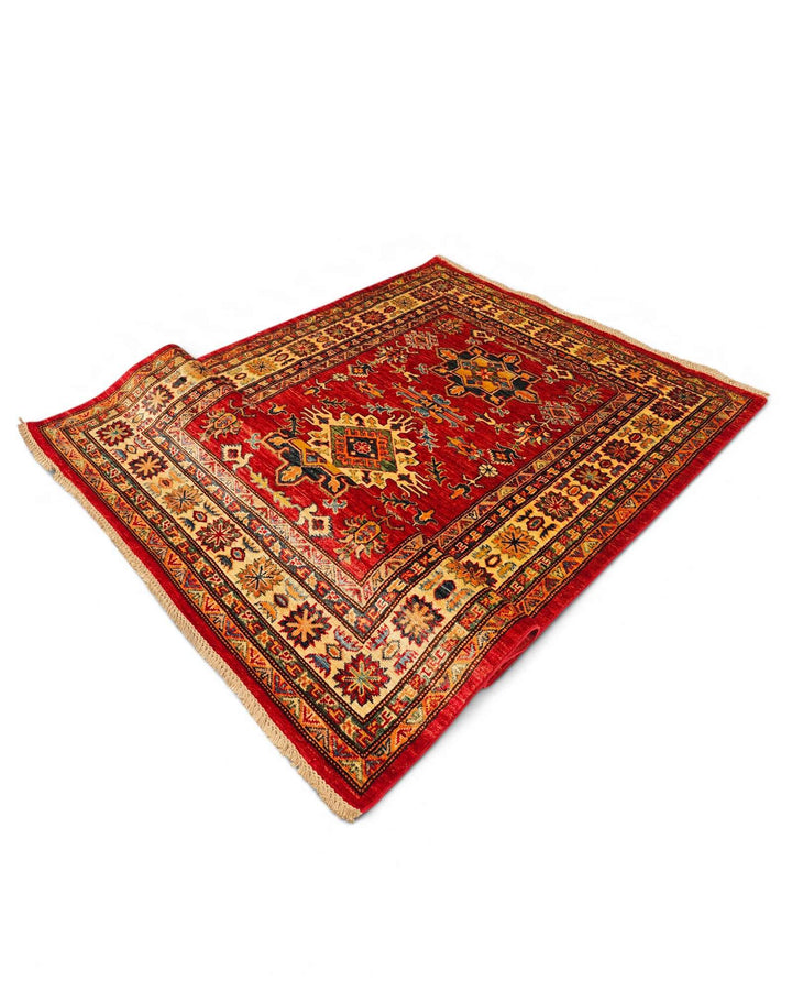 Hand-knotted Kazak rug with bold Caucasian geometry