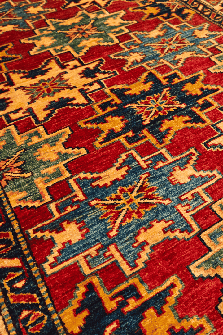 Hand-knotted wool pile of red Lesghi star rug, 120×156cm