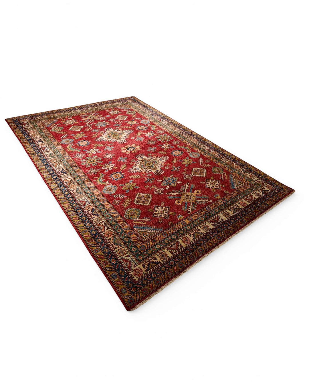 Corner of red gold tribal Kazak rug