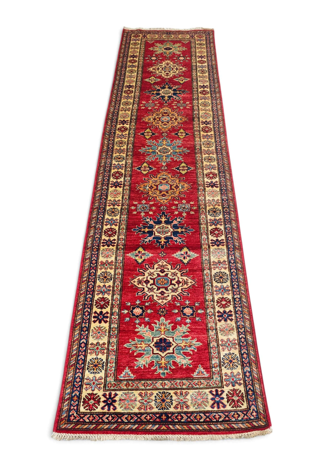 Border detail of red cream Kazak hand-knotted runner