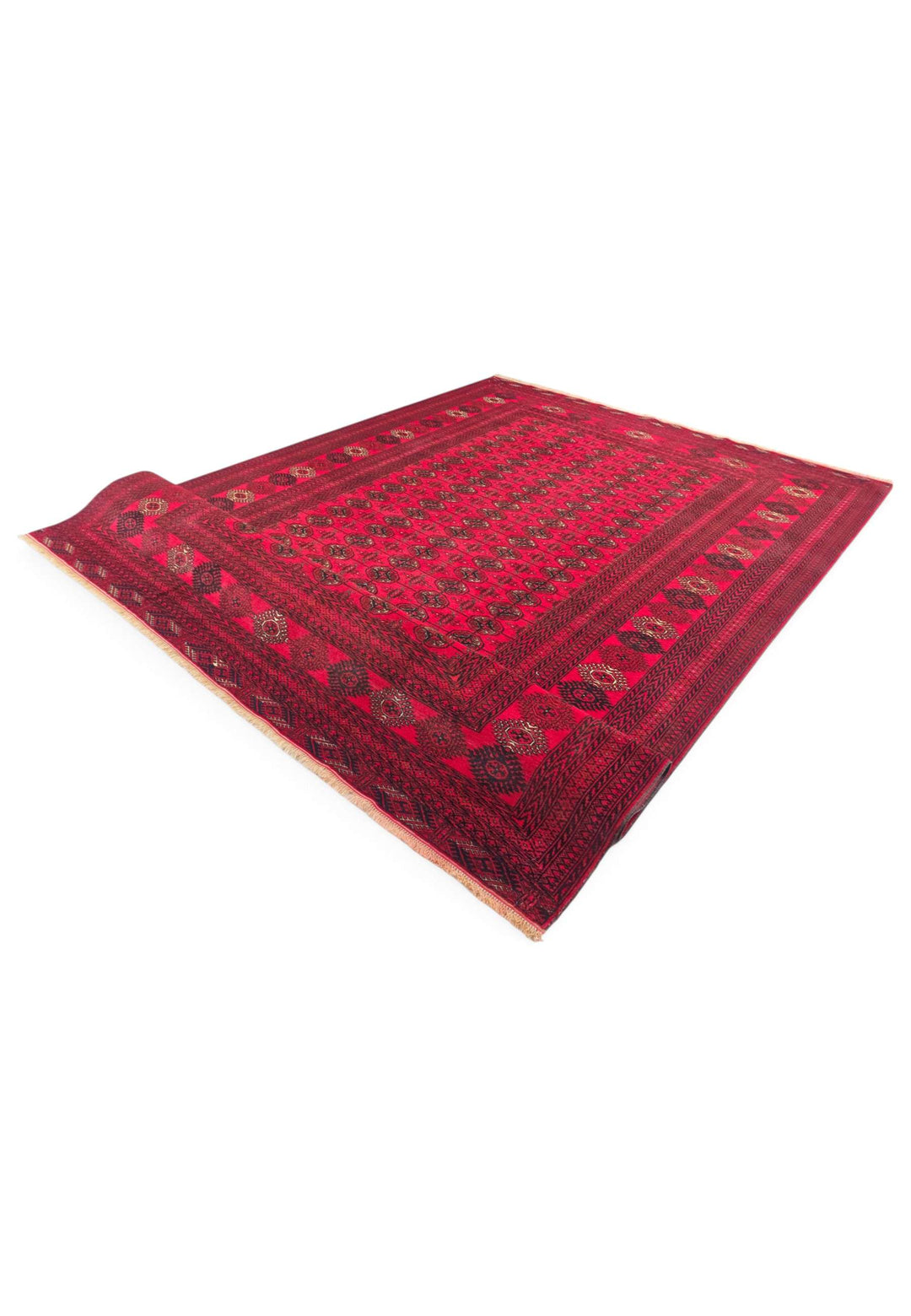 Fringe and end panel of bright red Afghan hand-knotted rug