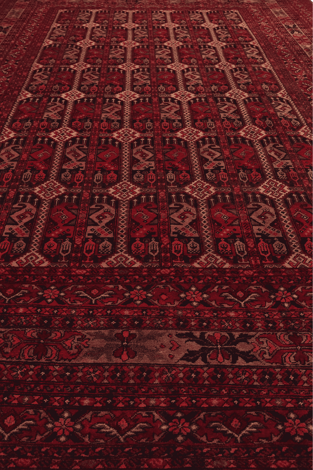 Corner of deep burgundy panel Khal Mohammadi rug