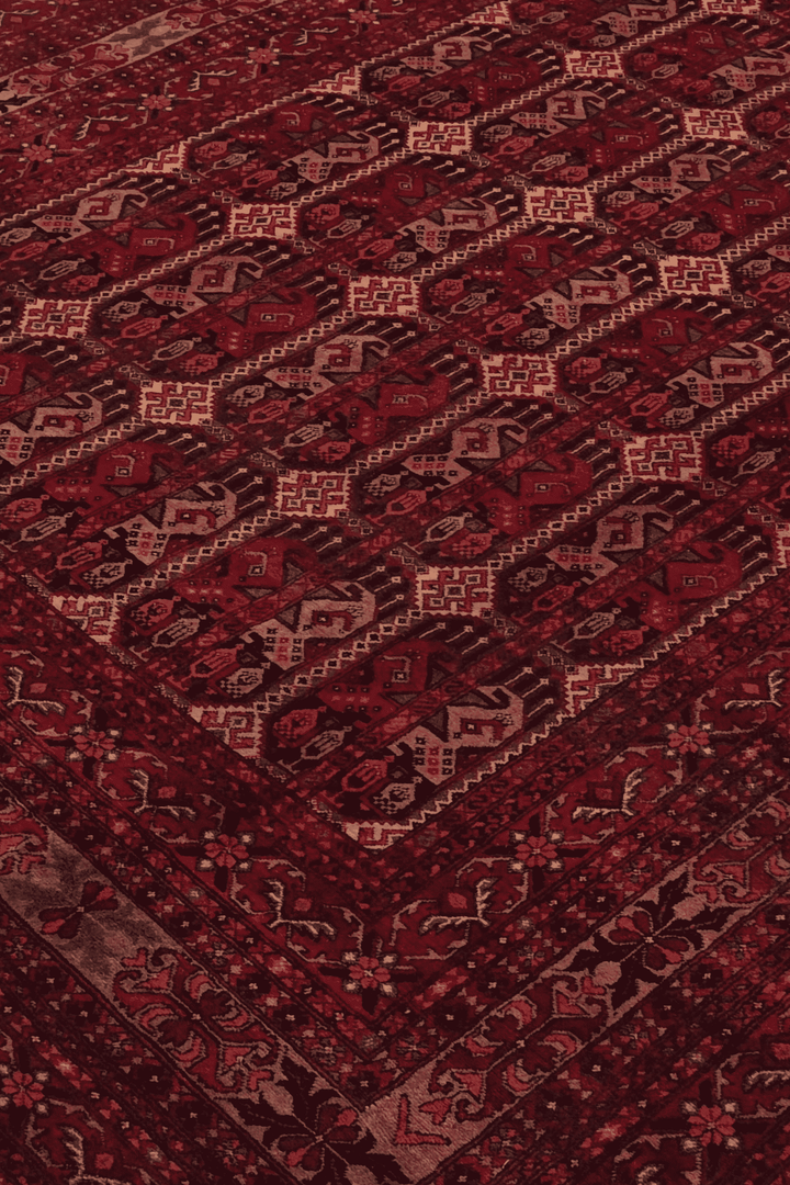 Panel detail in deep burgundy on Afghan Khal Mohammadi rug