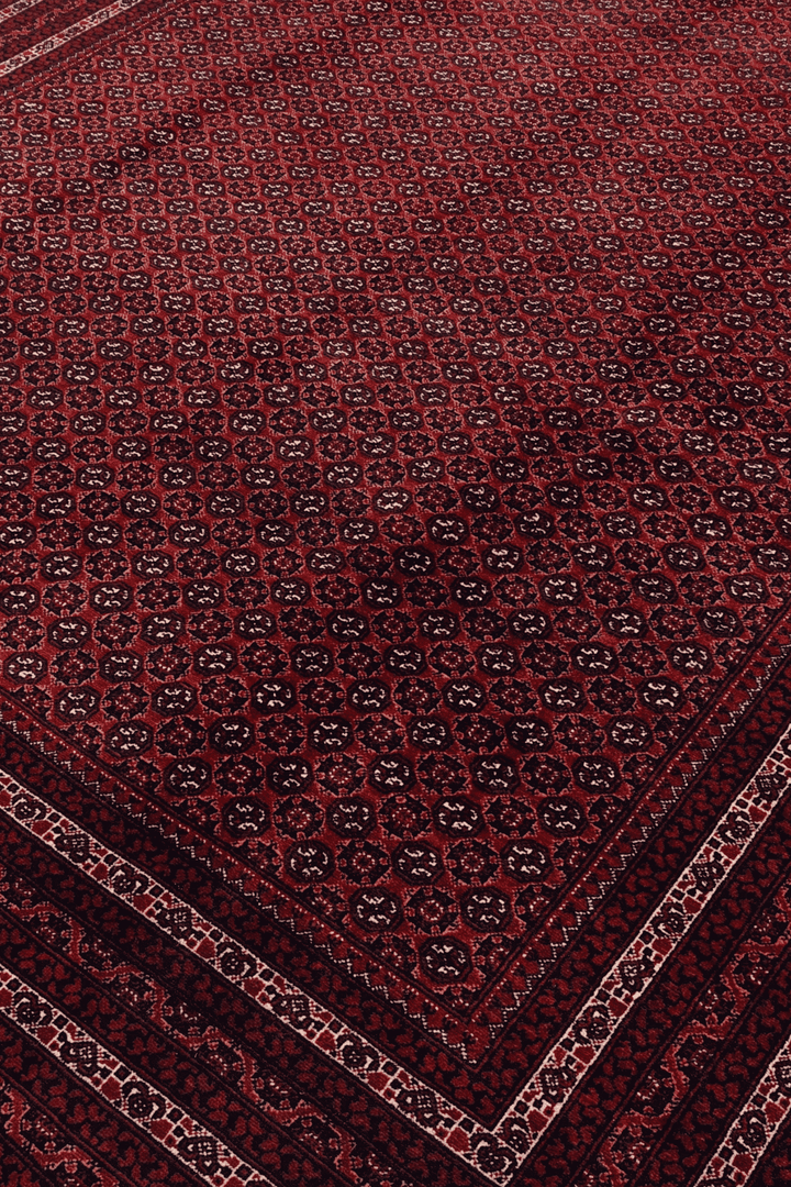 Turkmen gül motifs on deep burgundy Khoja Roshnai rug from Kunduz