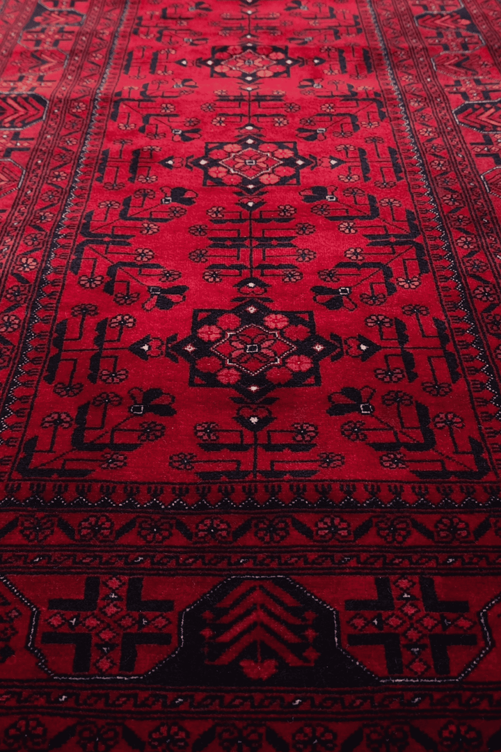 Hand-knotted Khal Mohammadi rug in deep madder red