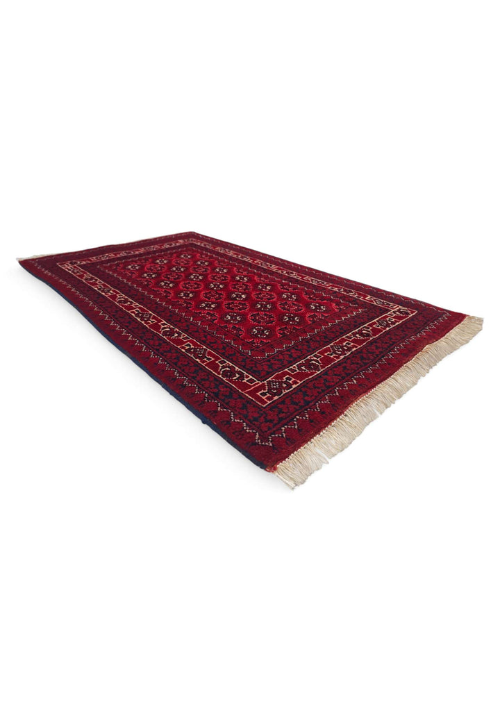 Hand-knotted wool pile of deep red Khal Mohammadi rug, 61×97cm