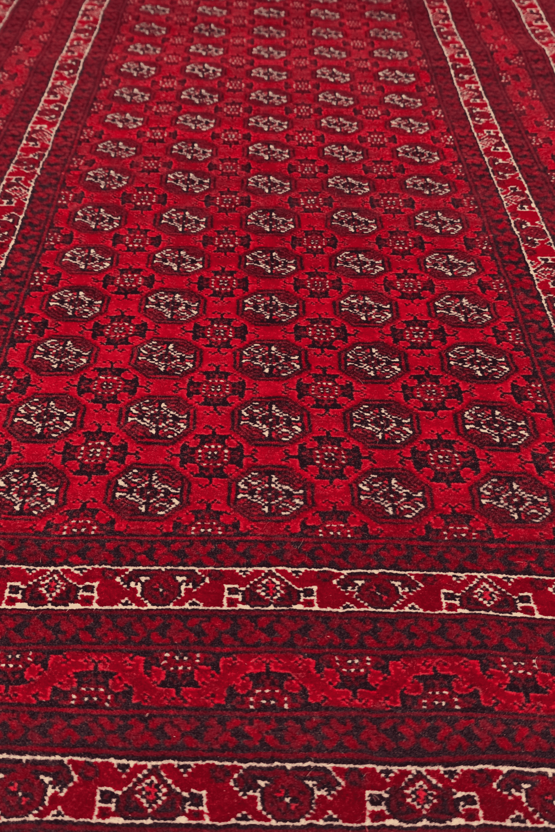 Hand-knotted Khal Mohammadi rug in deep madder red