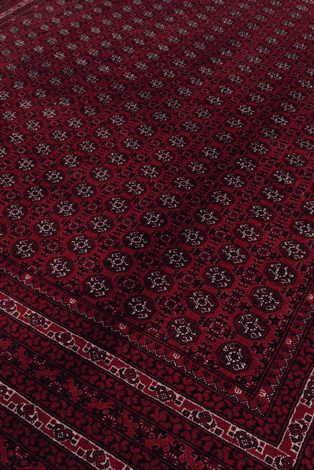Turkmen gül motifs on deep wine Khoja Roshnai rug from Kunduz