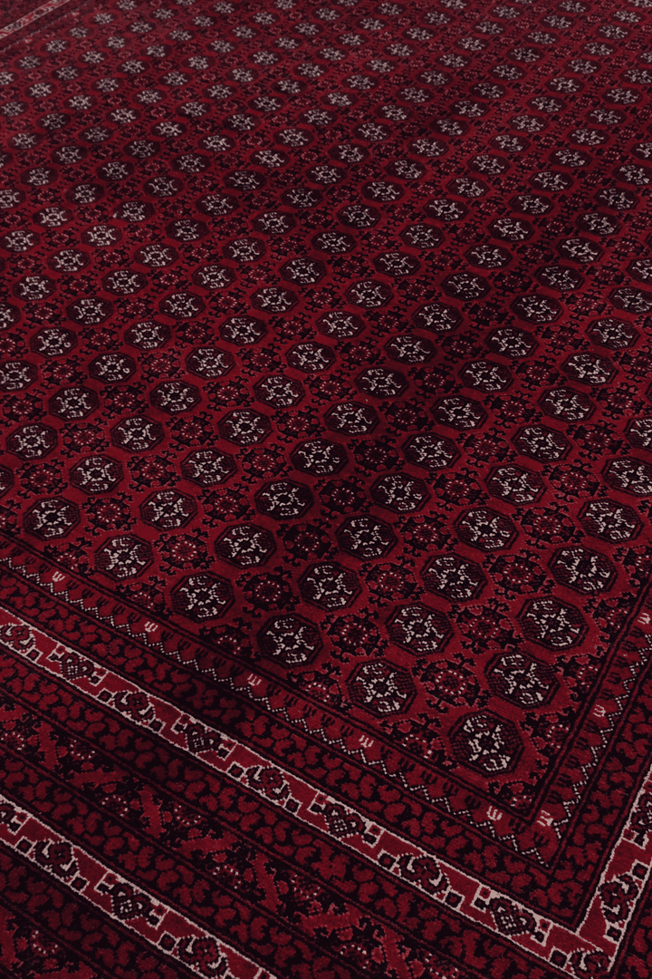 Turkmen gül motifs on deep wine Khoja Roshnai rug from Kunduz