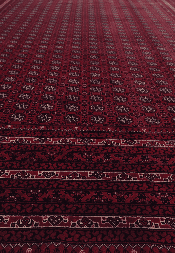Hand-knotted deep wine Roshnai rug with Turkmen güls