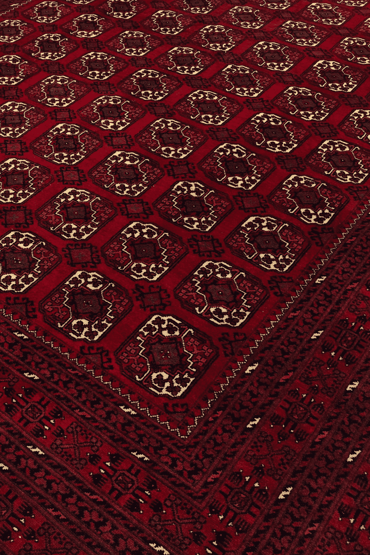 Turkmen gül motifs on oxblood Bashiri Afghan wool rug