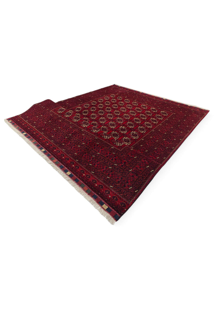 Hand-knotted oxblood Bashiri rug with repeating Turkmen güls