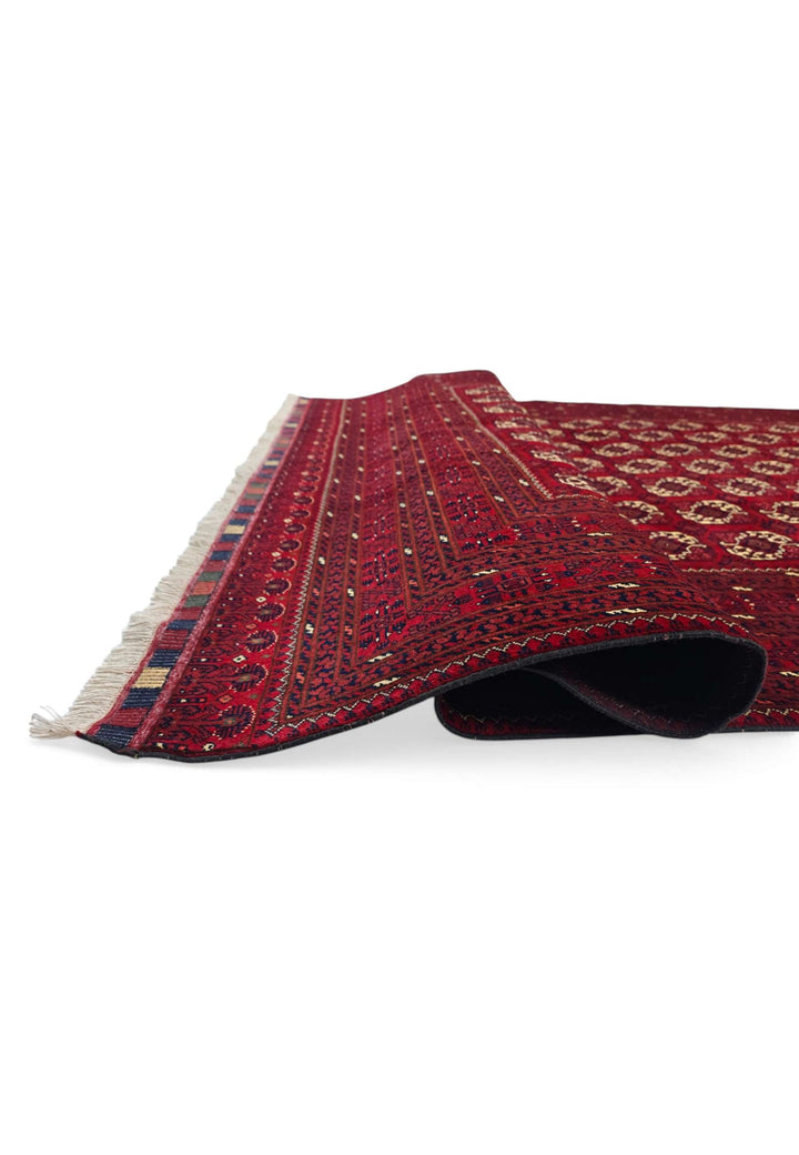 Fringe of oxblood Bashiri Afghan wool rug