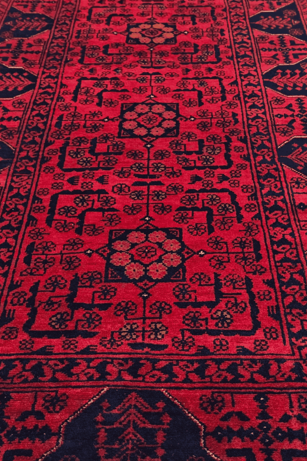Hand-knotted Khal Mohammadi runner in deep madder red