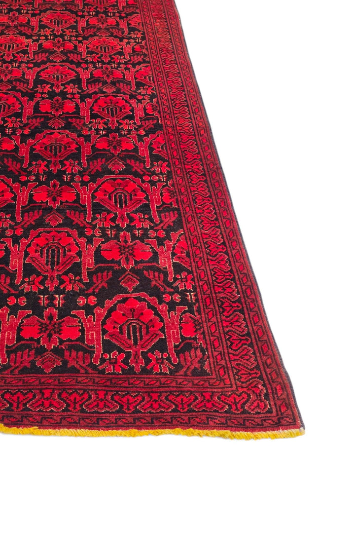 Corner of red black Khal Mohammadi rug, 76×186cm