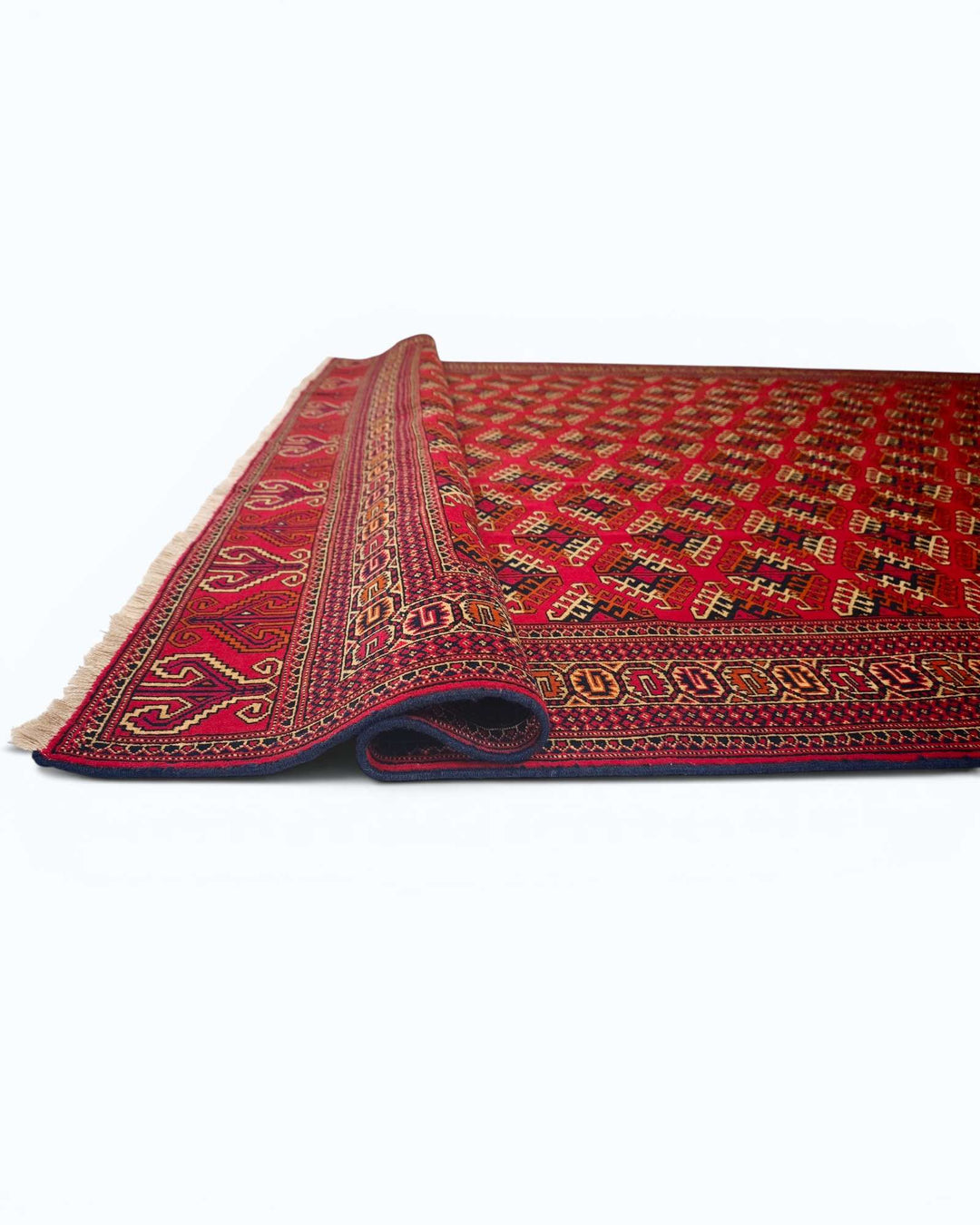 Corner of red Saryk Turkmen Afghan hand-knotted rug