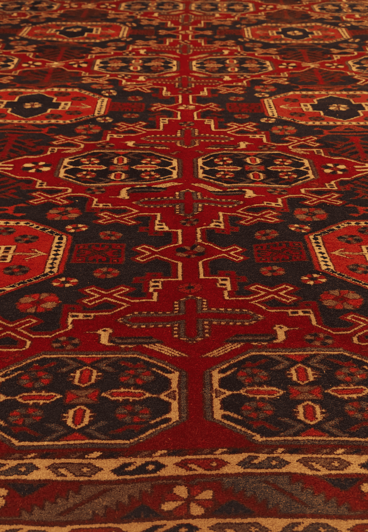 One-of-a-kind red Turkmen gül Afghan Sherwan rug