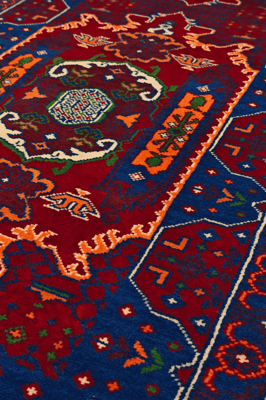 Pattern detail in red and blue on Khal Mohammadi rug
