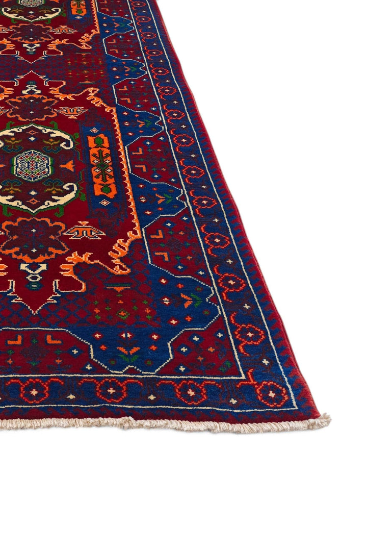 Corner of red blue Khal Mohammadi hand-knotted rug