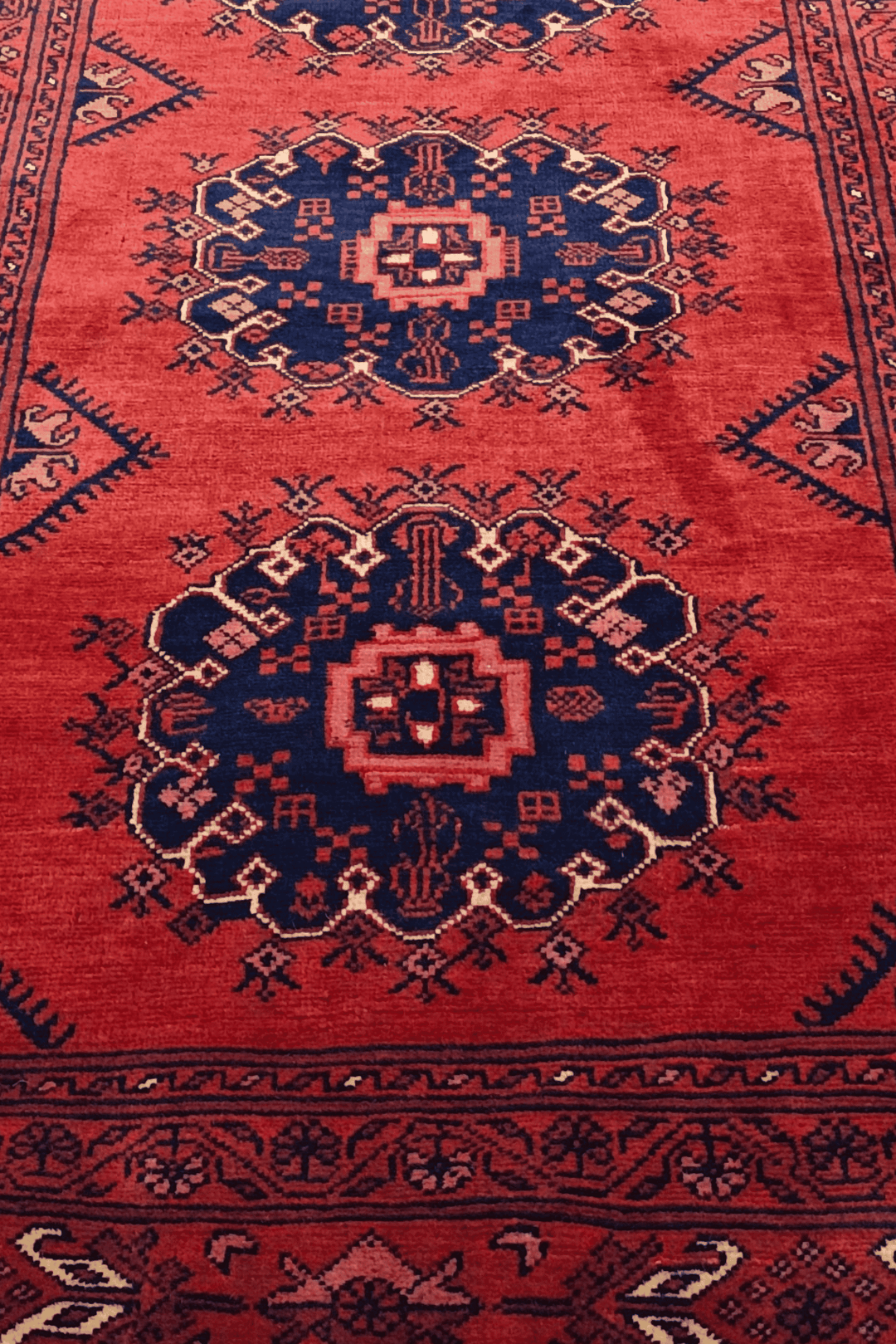 Hand-knotted Khal Mohammadi runner in deep madder red