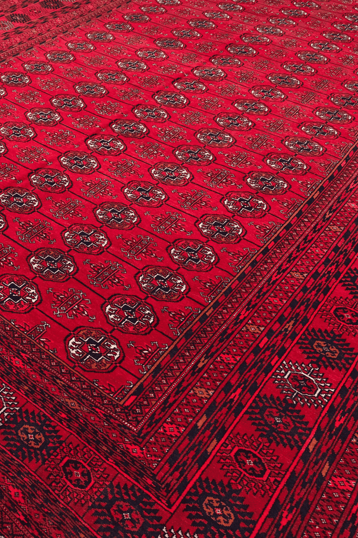Turkmen gül detail in ruby red on Khal Mohammadi rug