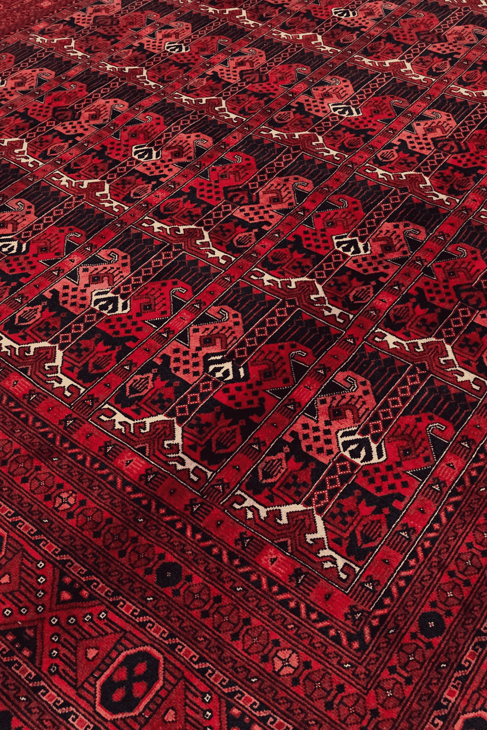 Panel detail in wine red on Afghan Khal Mohammadi rug