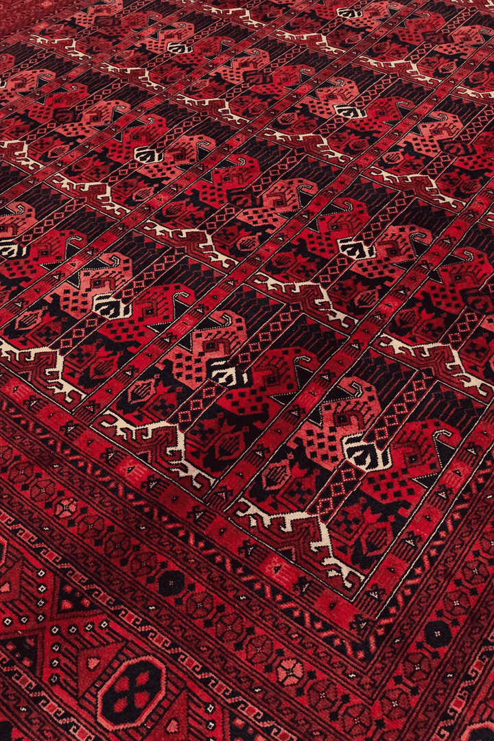 Panel detail in wine red on Afghan Khal Mohammadi rug