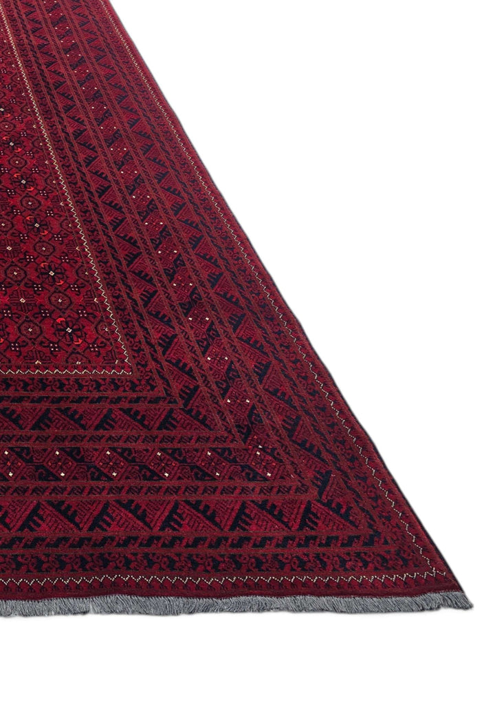 Corner of wine red Mina Khani hand-knotted Ersari rug