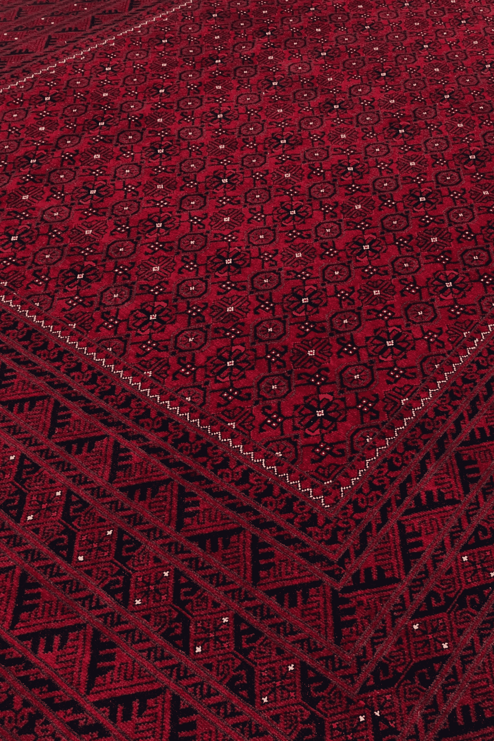 Mina Khani design with alma gül motifs on wine red Ersari rug