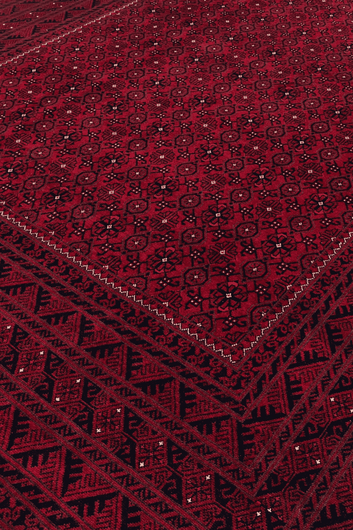 Mina Khani design with alma gül motifs on wine red Ersari rug