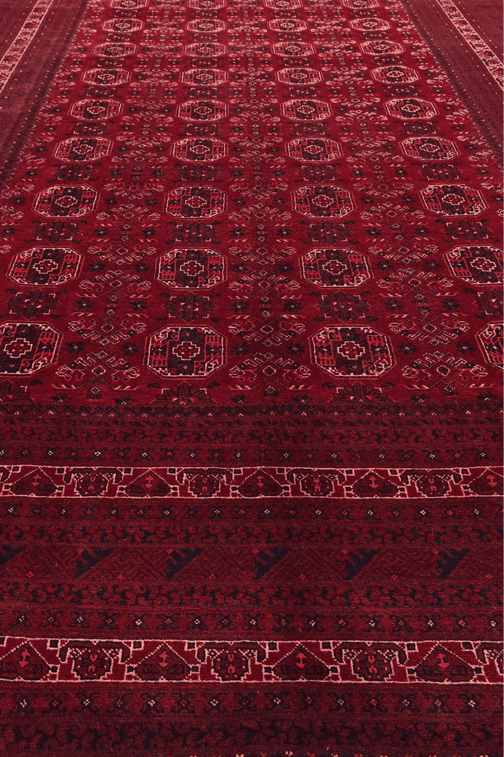 Corner of wine red Turkmen gül Khal Mohammadi rug