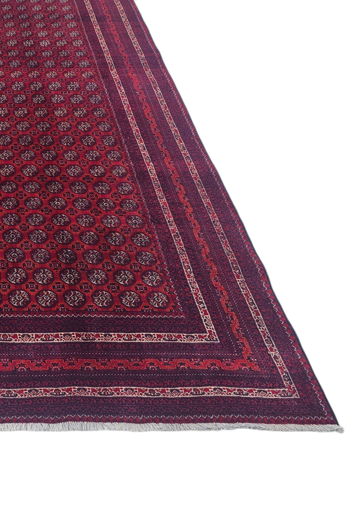 Corner of wine red Turkmen Khal Mohammadi rug
