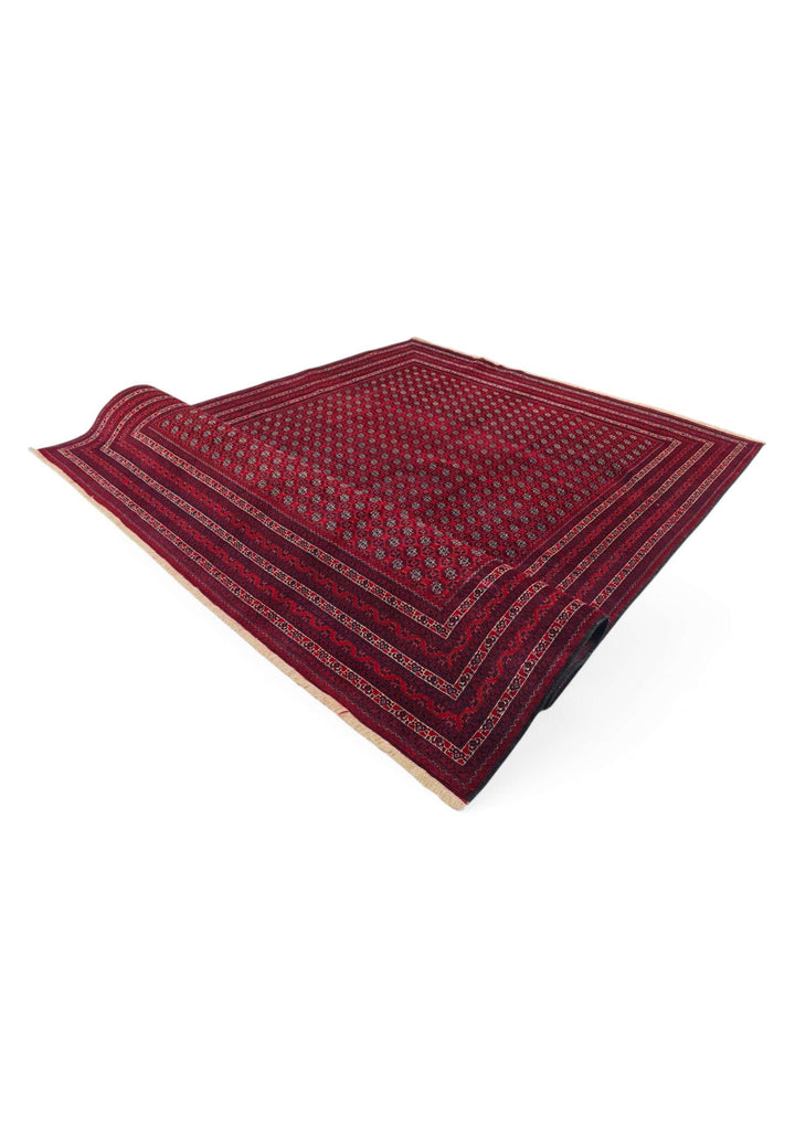 Hand-knotted wine red Roshnai rug with Turkmen güls