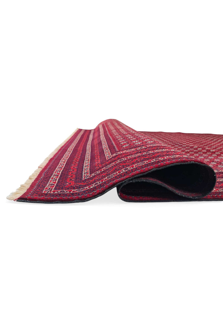 Fringe of wine red Khoja Roshnai Afghan wool rug