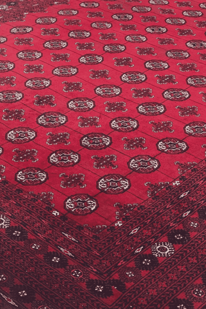 Turkmen gül motifs on wine red Afghan Sherwan rug, 200×288cm
