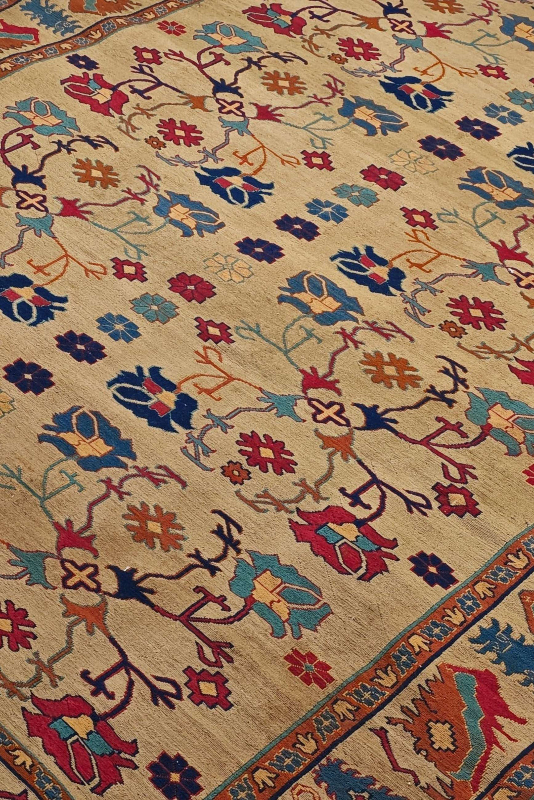 Palmette detail in camel gold and rust on Afghan kilim