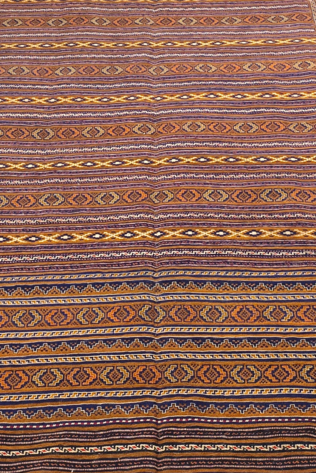 One-of-a-kind caramel and gold banded Afghan kilim