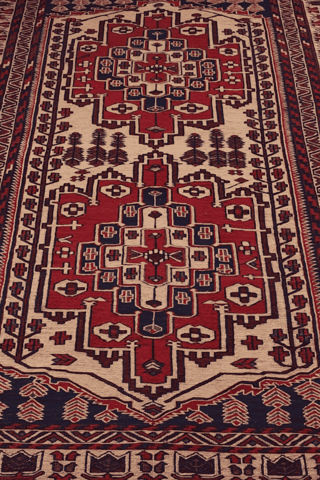 One-of-a-kind deep red stepped Turkmen medallion kilim