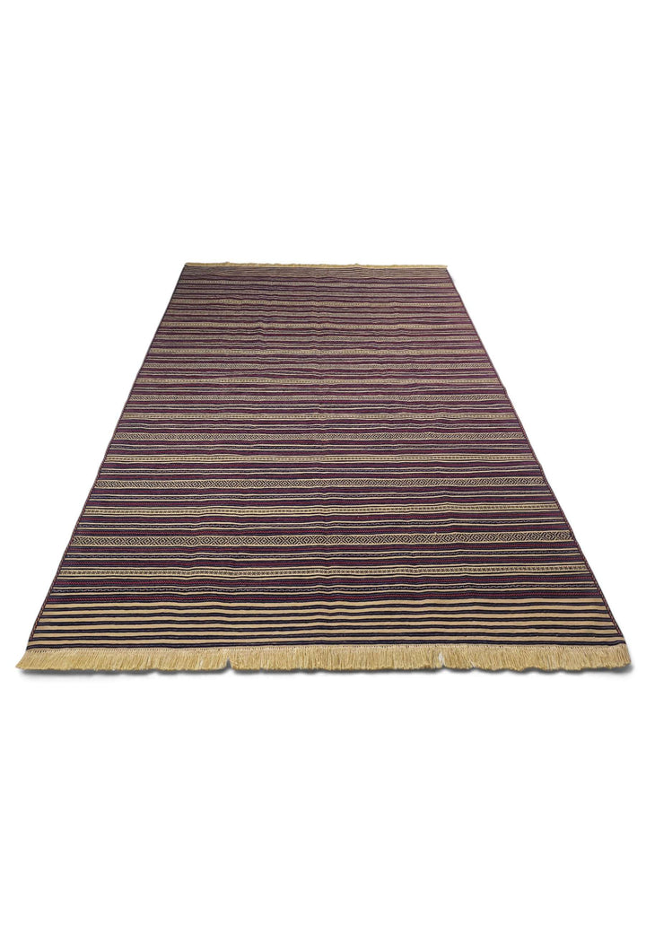 Border detail of aubergine wheat hand-woven kilim